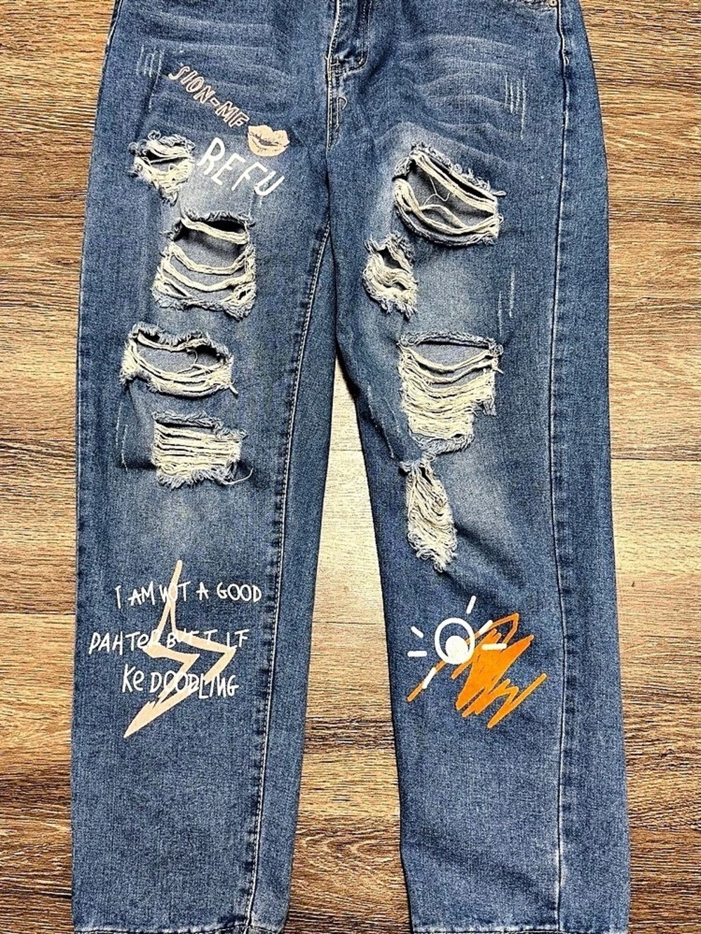 Surprise Distressed Straight Leg Jeans in Blue